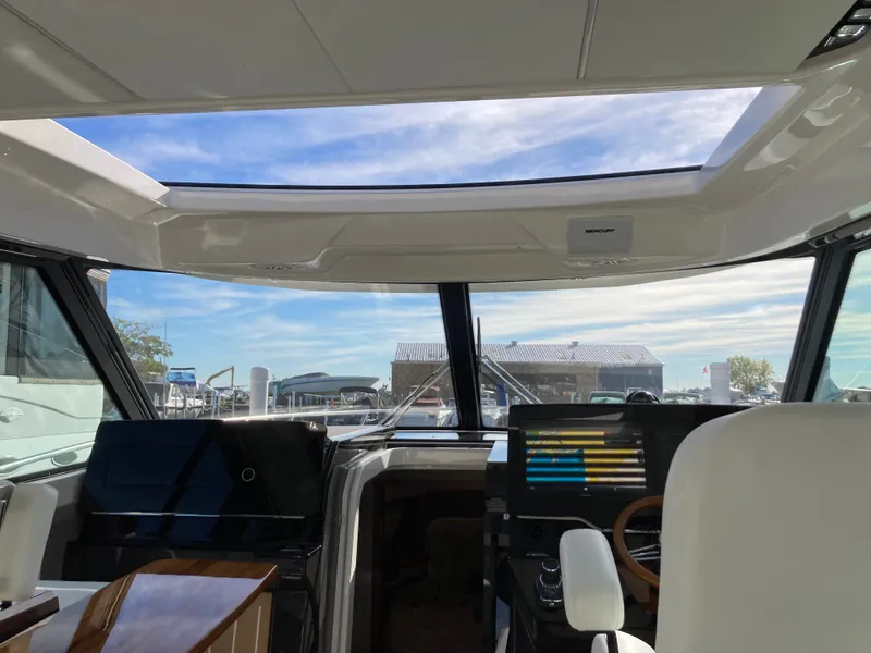 Slide: The Image of Interior view of a modern yacht with large windows and a panoramic roof. - 12