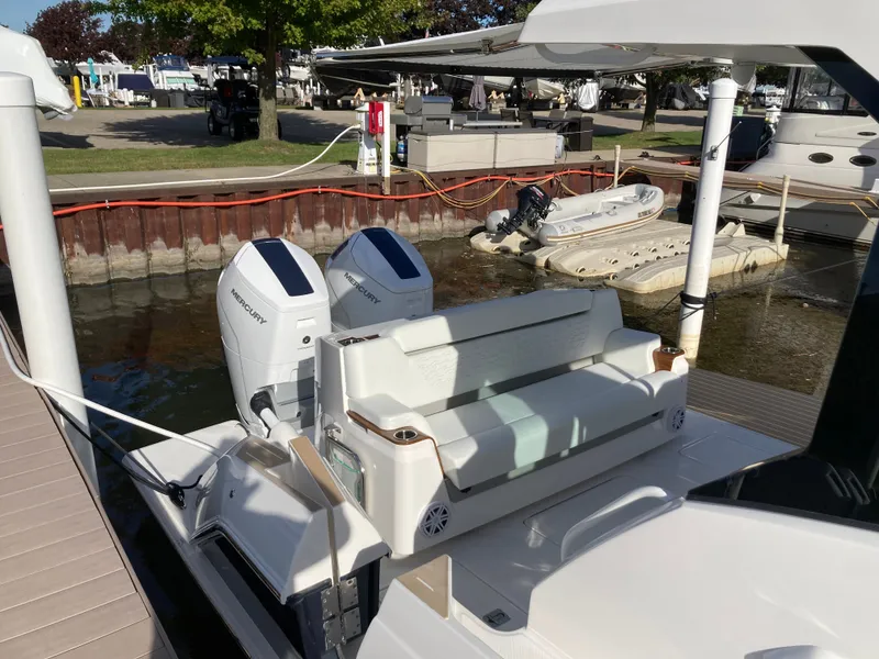 Slide: The Image of The image shows a 2027 Tiara Yachts 39LE boat with twin outboard engines at a dock. - 4