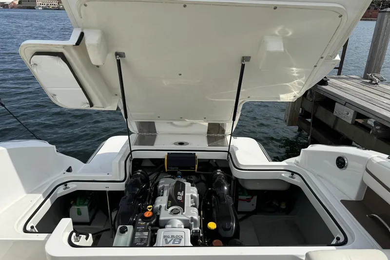 Slide: The Image of Open engine compartment of a 2014 Cobalt R5 boat, featuring a Big Block V8 engine. - 3