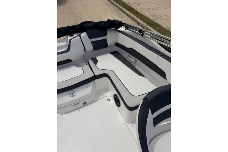 Slide: The Image of 2026 Yamaha Boats SX195 interior seating with sleek design and modern upholstery. - 16