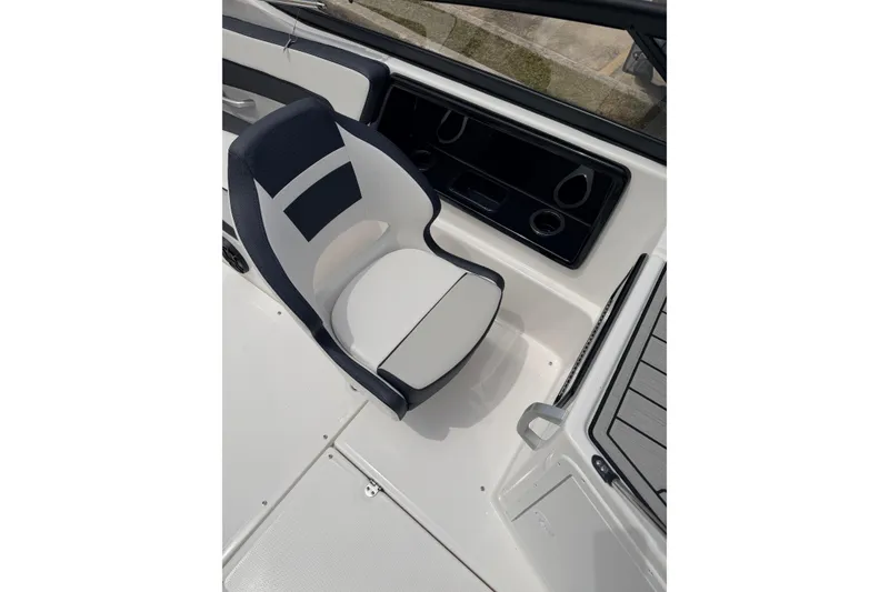 Slide: The Image of 2026 Yamaha Boats SX195 interior with sleek seating and modern dashboard design. - 17
