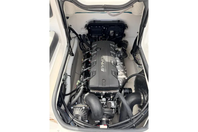 Slide: The Image of 2026 Yamaha Boats SX195 engine compartment showcasing advanced marine technology. - 19