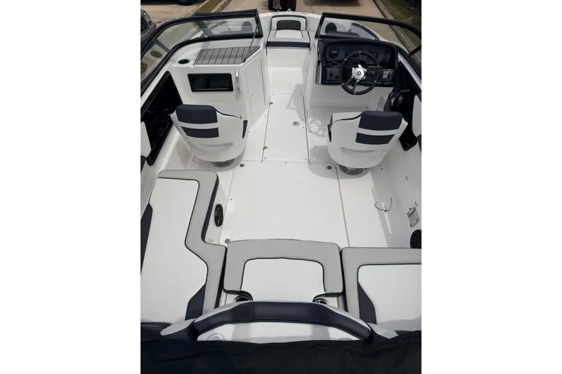 Slide: The Image of 2026 Yamaha Boats SX195 interior with sleek seating and modern dashboard design. - 9