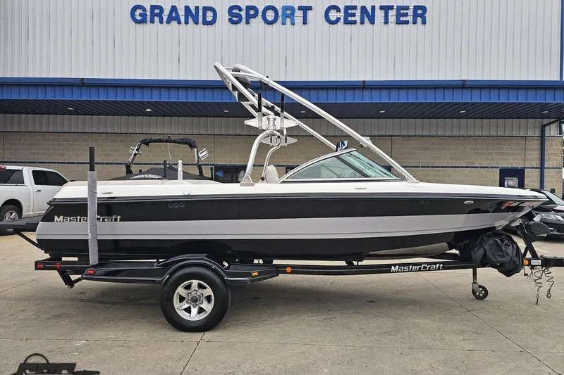 The Image of 2005 MasterCraft X-2 boat on trailer at Grand Sport Center dealership. - 1