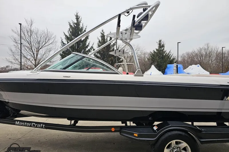 Slide: The Image of 2005 MasterCraft X-2 boat on trailer, side view with wakeboard tower. - 20