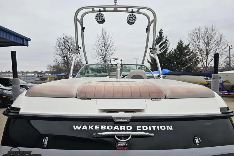 Slide: The Image of 2005 MasterCraft X-2 Wakeboard Edition boat with tower speakers and racks. - 30