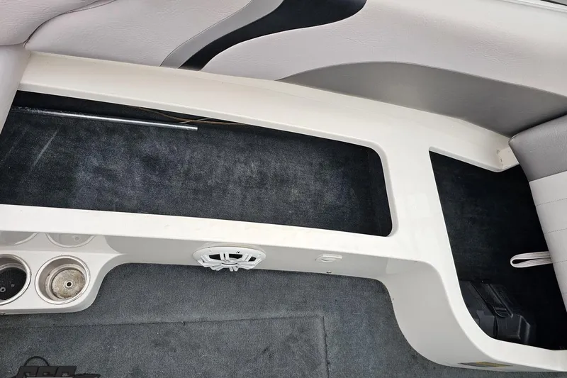 Slide: The Image of Interior of a 2005 MasterCraft X-2 boat showing seating and speaker details. - 44