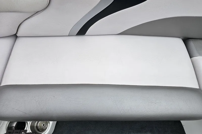 Slide: The Image of 2005 MasterCraft X-2 boat seat with gray and white upholstery. - 45