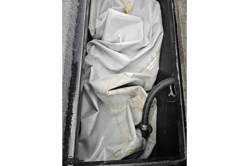 Slide: The Image of Ballast bag in a 2005 MasterCraft X-2 boat compartment. - 55