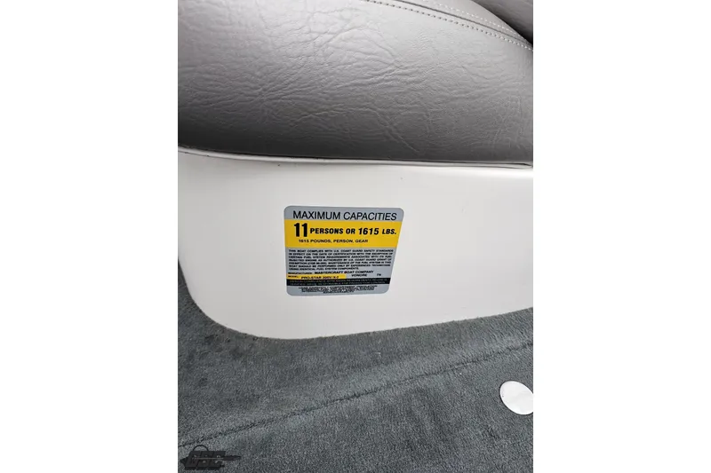 Slide: The Image of 2005 MasterCraft X-2 capacity label, seating for 11 people or 1615 lbs. - 56