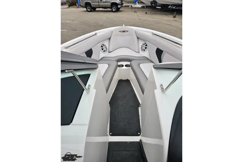 Slide: The Image of 2005 MasterCraft X-2 boat interior with gray seating and speakers. - 62