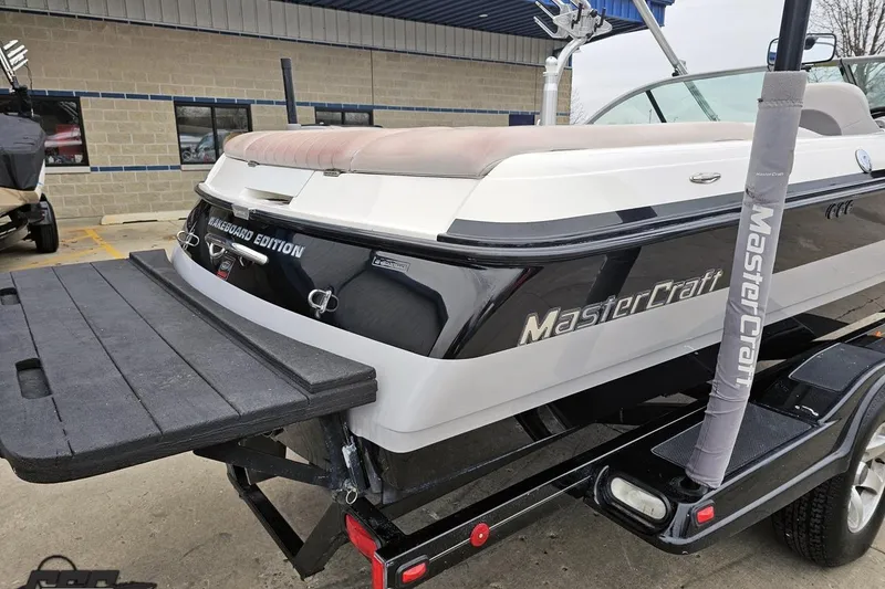 Slide: The Image of 2005 MasterCraft X-2 Wakeboard Edition boat on trailer, rear view. - 7