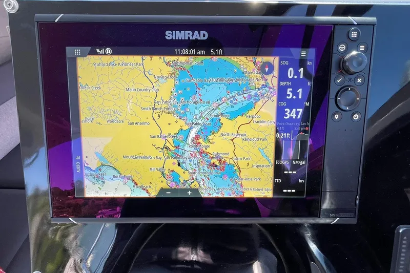 Slide: The Image of Simrad navigation display on 2006 Protector Targa 28, showing detailed marine chart. - 13