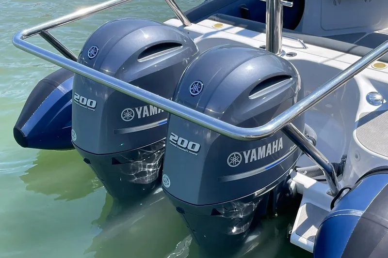 Slide: The Image of Twin Yamaha 200 outboard engines on a 2006 Protector Targa 28 boat. - 15