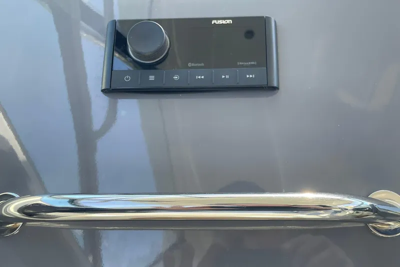 Slide: The Image of Control panel and handle on 2006 Protector Targa 28 boat dashboard. - 41