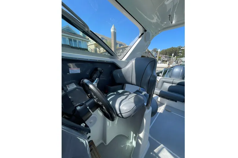 Slide: The Image of Interior of a 2006 Protector Targa 28 boat with helm station. - 45