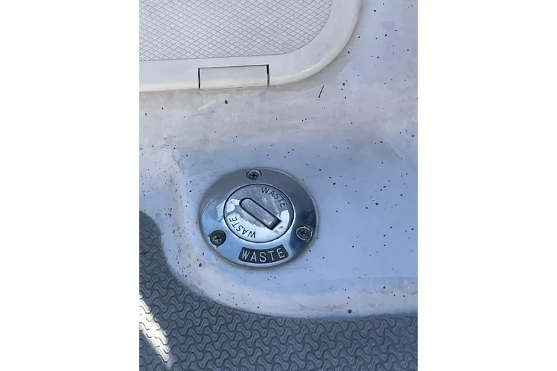 Slide: The Image of Waste cap on 2006 Protector Targa 28 boat deck. - 53