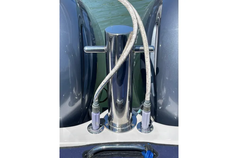 Slide: The Image of 2006 Protector Targa 28 boat detail with chrome fittings and cables on deck. - 60