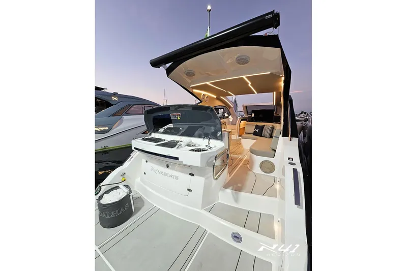 Slide: The Image of 2025 NX Boats NX41 HORIZON luxury yacht with modern interior and sleek design. - 12