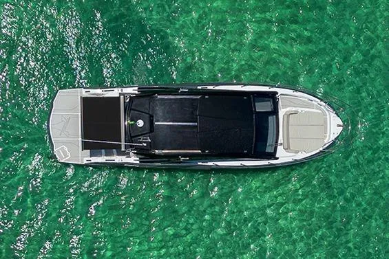 Slide: The Image of Top view of 2025 NX Boats NX41 HORIZON on clear turquoise water. - 18