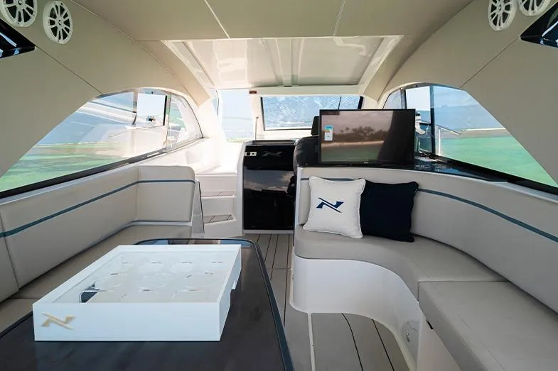 Slide: The Image of Luxurious interior of 2025 NX Boats NX41 HORIZON with elegant seating and modern amenities. - 24