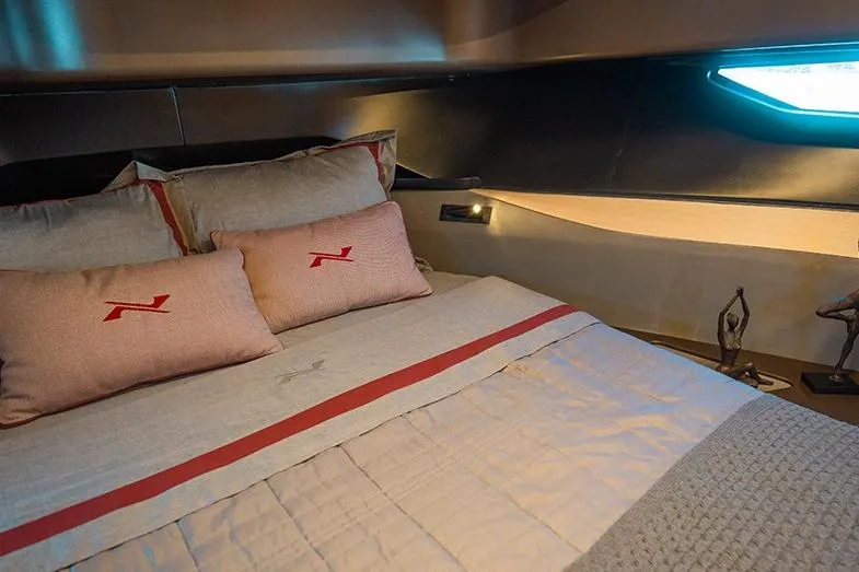 Slide: The Image of Luxurious bedroom interior of 2025 NX Boats NX41 HORIZON yacht with elegant bedding. - 31