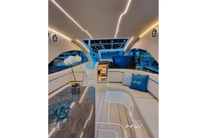 Slide: The Image of Luxurious interior of 2025 NX Boats NX41 HORIZON with modern seating and elegant decor. - 5