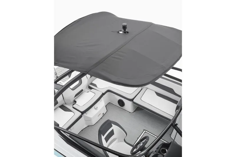 Slide: The Image of Manufacturer Provided Image: 2026 Yamaha Boats AR195 interior with black canopy and modern seating design. - 2