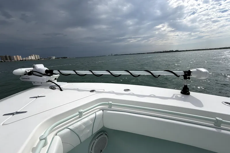 Slide: The Image of 2019 Contender 30 ST boat with Garmin equipment on open water under cloudy sky. - 14