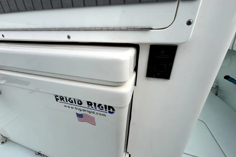 Slide: The Image of 2019 Contender 30 ST boat with Frigid Rigid cooler and American flag sticker. - 26