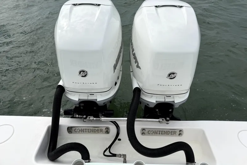 Slide: The Image of Twin Mercury FourStroke engines on a 2019 Contender 30 ST boat. - 33
