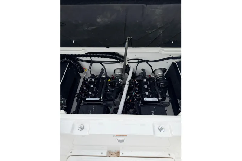 Slide: The Image of 2026 Yamaha Boats AR220 engine compartment showcasing dual engines and components. - 16
