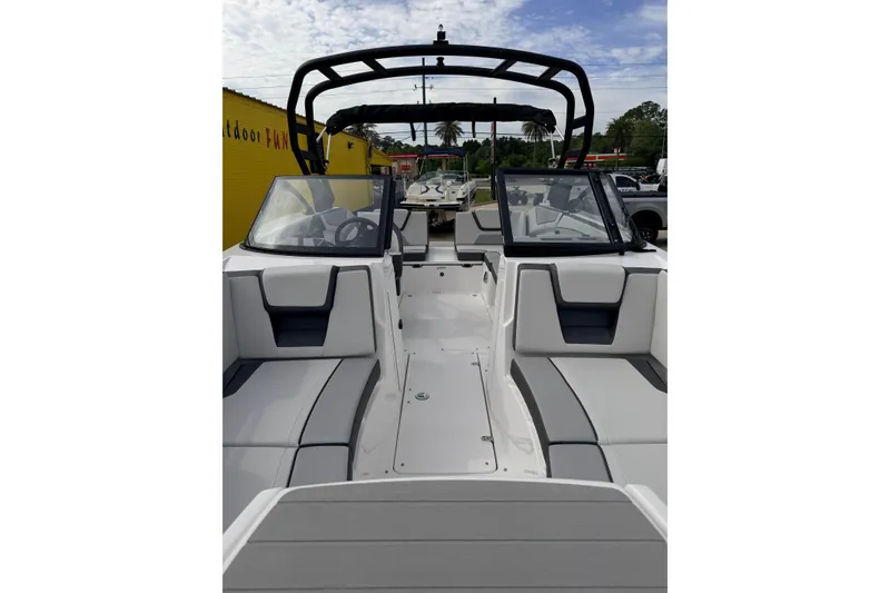 Slide: The Image of 2026 Yamaha Boats AR220 interior with sleek seating and modern design. - 4