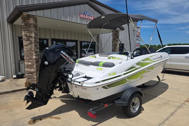 Slide: The Image of 2022 Tahoe T16 boat with Mercury engine, parked outside N&L Marine dealership. - 7