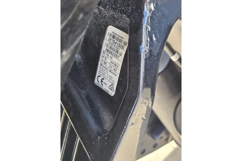 Slide: The Image of Close-up of a 2022 Tahoe T16 model label with serial number details. - 8