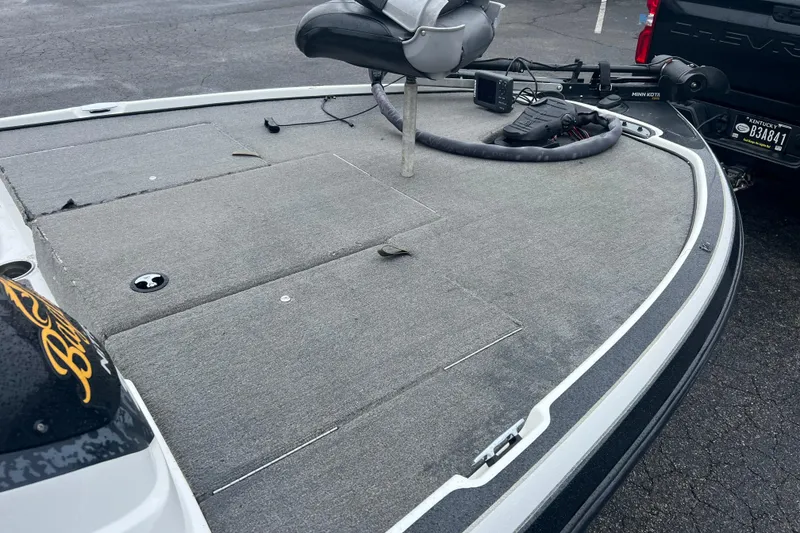 Slide: The Image of 2011 Nitro Z-6 boat deck with seating and fishing equipment. - 2