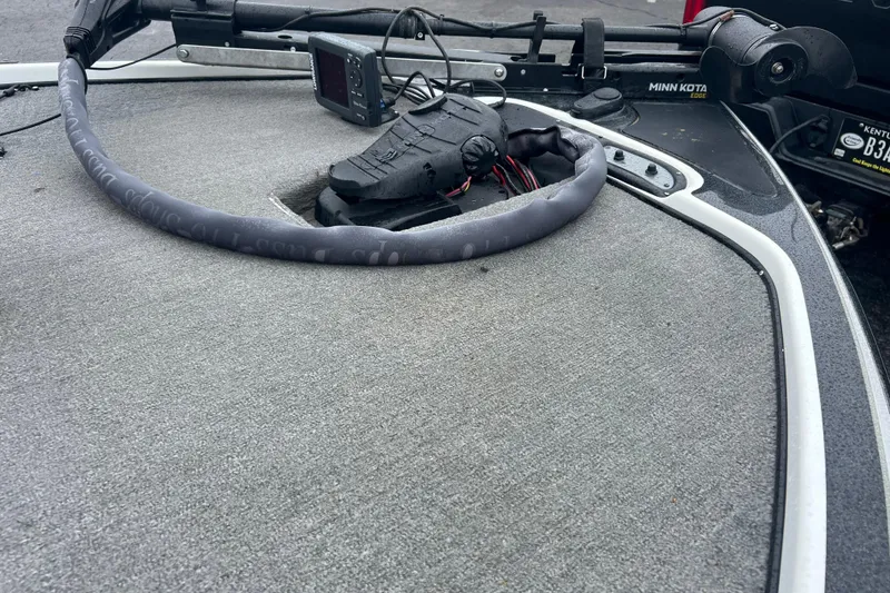 Slide: The Image of 2011 Nitro Z-6 boat deck with Minn Kota trolling motor and fish finder. - 3