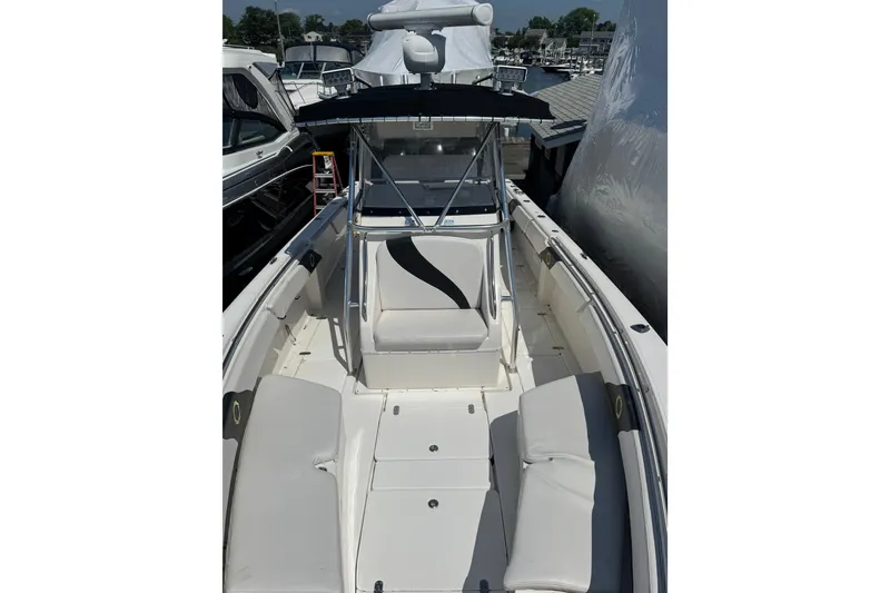 Slide: The Image of 2007 Fountain 34 Center Console boat with spacious seating and sleek design. - 10