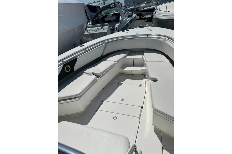 Slide: The Image of 2007 Fountain 34 Center Console boat with spacious seating and sleek design. - 15