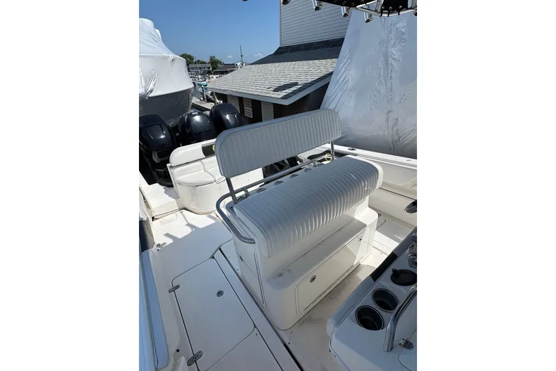 Slide: The Image of 2007 Fountain 34 Center Console boat interior with seating and controls. - 16