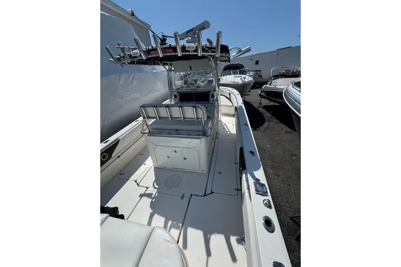 Slide: The Image of 2007 Fountain 34 Center Console boat with spacious deck and modern controls. - 6