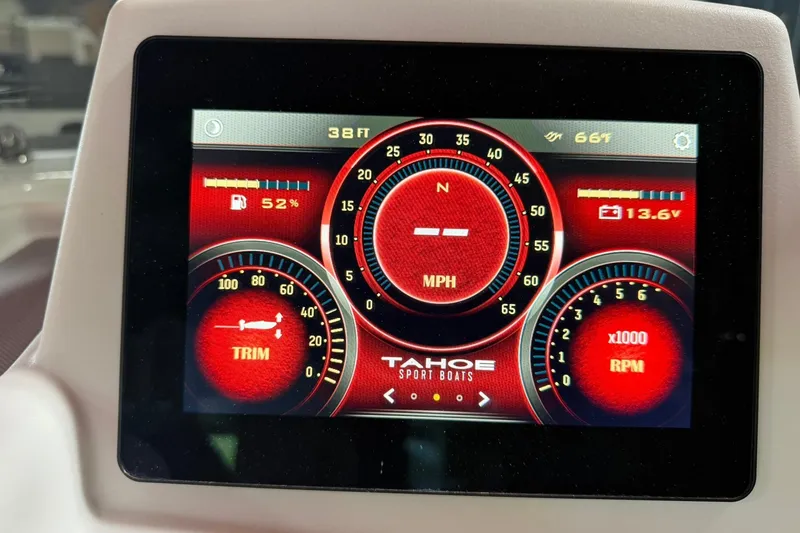 Slide: The Image of Dashboard display of 2024 Tahoe T18 boat showing speed, RPM, fuel, and trim settings. - 13