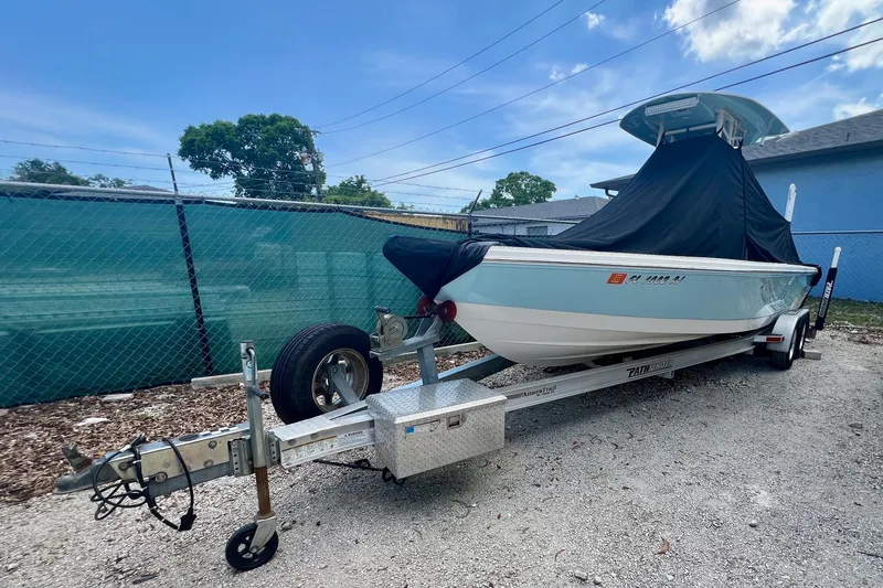 The Image of 2017 Pathfinder 2400 TRS boat on trailer, covered, parked outdoors. - 0