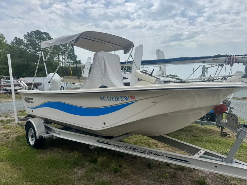 Slide: The Image of 2022 Carolina Skiff 19 LS boat on trailer outdoors. - 1