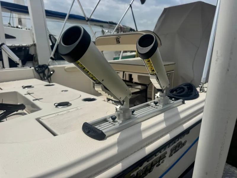 Slide: The Image of Fishing rod holders on a 2022 Carolina Skiff 19 LS boat. - 11