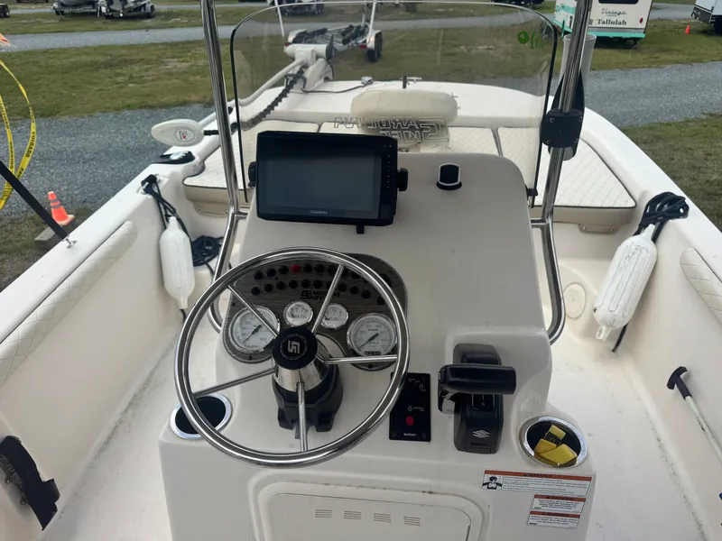 Slide: The Image of Interior view of 2022 Carolina Skiff 19 LS boat with helm console. - 6