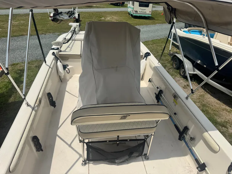 Slide: The Image of Interior view of a 2022 Carolina Skiff 19 LS boat with cover. - 7