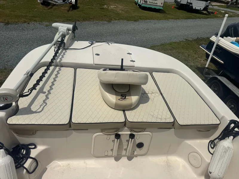 Slide: The Image of 2022 Carolina Skiff 19 LS boat with cushioned seating and accessories. - 8