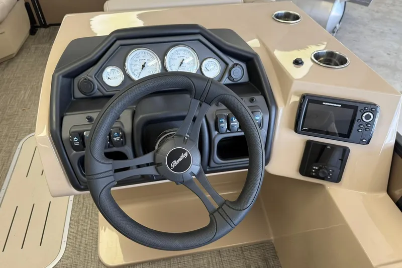 Slide: The Image of Steering console of 2026 Bentley Pontoons Legacy 223 Swingback with gauges and controls. - 6