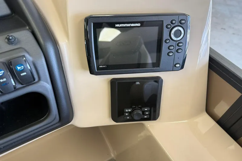 Slide: The Image of Control panel of 2026 Bentley Pontoons Legacy 223 Swingback with Humminbird and JBL systems. - 7